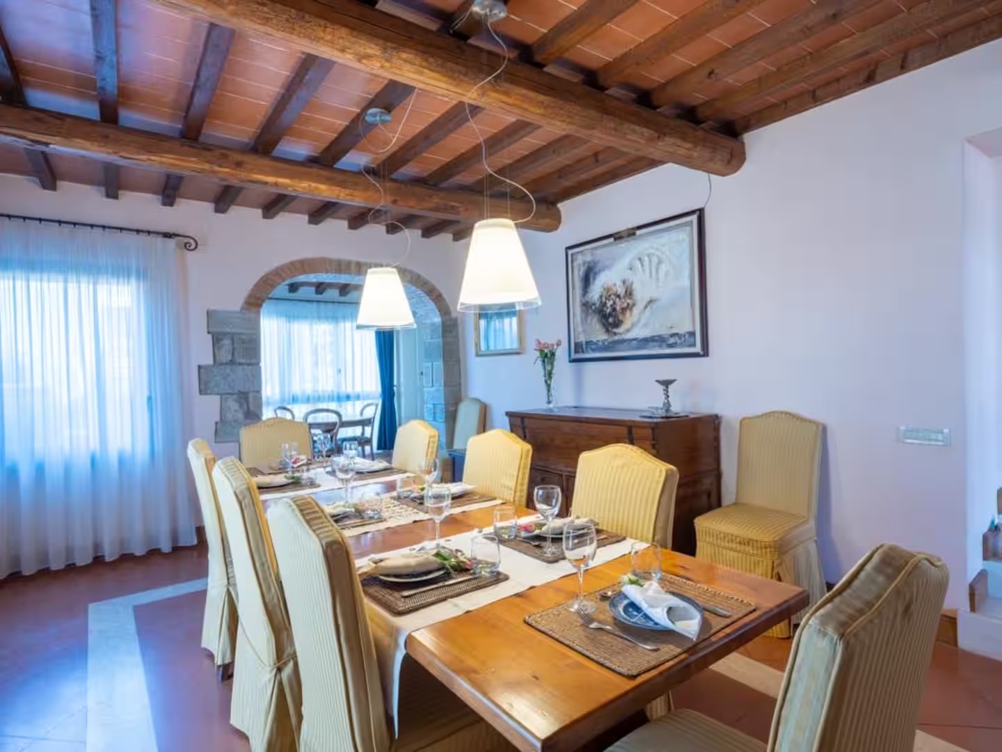 Villa dining room with a table set for a shared meal